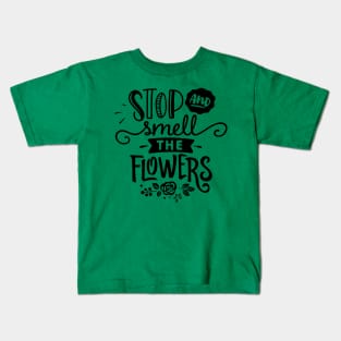 Stop and smell flowers Kids T-Shirt